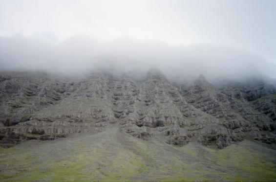 Rockfaces covered in low cloud and mist